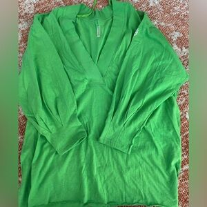 Free people top. never worn. Size medium